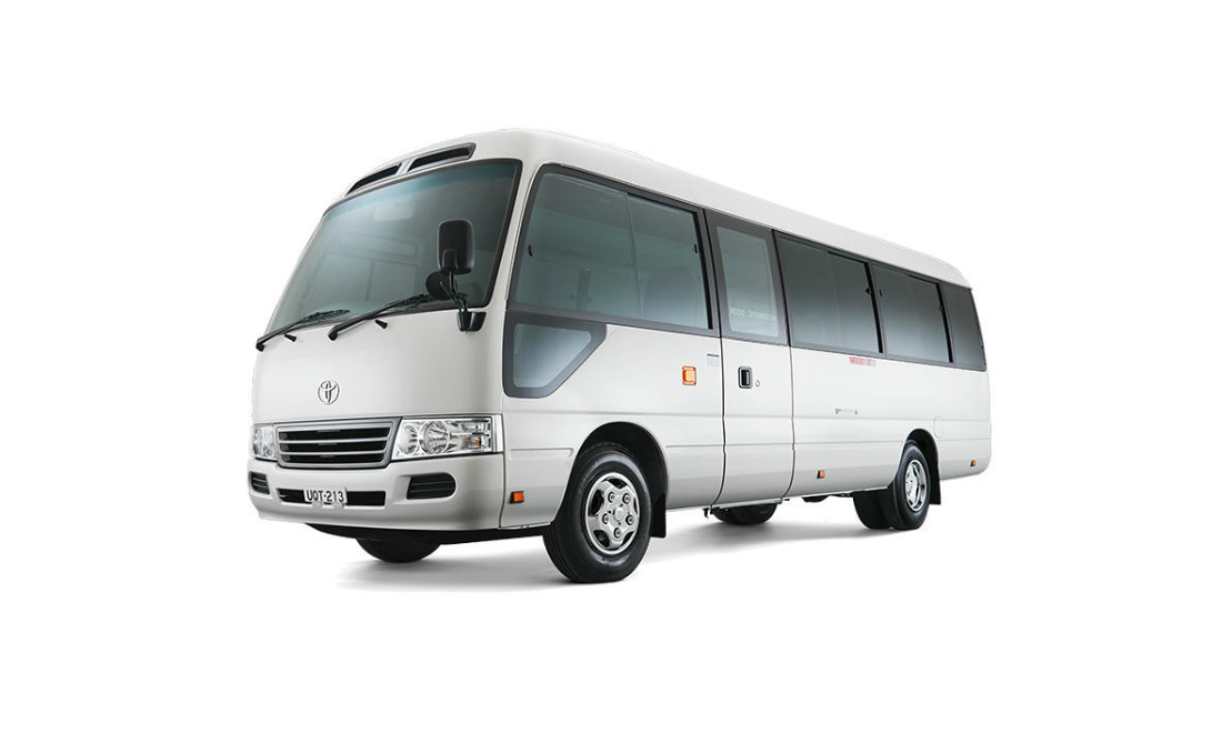 Toyota Coaster bus large Umrah group transport Saudi Arabia Nexa Transports